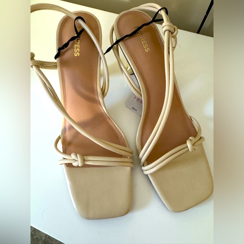 Express tan sandals with gold wedges